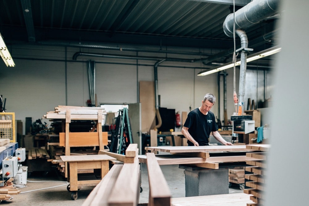 Handcrafted manufacturing of high-end designer tables