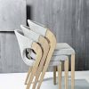 Meubles haut de gamme en chêne - fauteuil bois massif et textile gris empilés à trois - design allemand